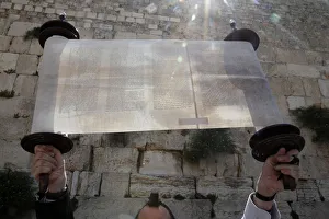 A ceremonial reading of the Torah from Torah scroll under the Western Wall, Jerusalem A ceremonial reading of the Torah from Torah scroll under the Western Wall, Jerusalem