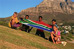 Children with national flag, South Africa, Africa Children with national flag, South Africa, Africa