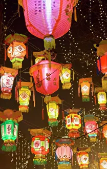 Chinese park decorated with bright and colorful hand-made lanterns during Chinese New Year Chinese park decorated with bright and colorful hand-made lanterns during Chinese New Year