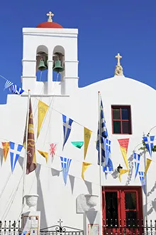 Church with flags in Mykonos Town, Mykonos Island, Cyclades, Greek Islands, Greece, Europe Church with flags in Mykonos Town, Mykonos Island, Cyclades, Greek Islands, Greece, Europe
