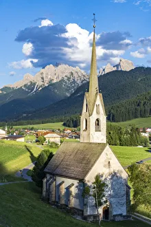 Church in the green landscape of alpine village of Villabassa (Niederdorf), Val Pusteria Church in the green landscape of alpine village of Villabassa (Niederdorf), Val Pusteria