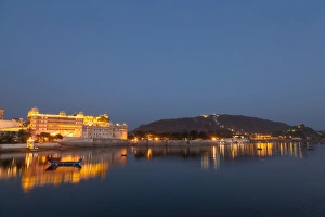 City Palace in Udaipur at night, reflected in Lake Pichola, Udaipur, Rajasthan, India City Palace in Udaipur at night, reflected in Lake Pichola, Udaipur, Rajasthan, India