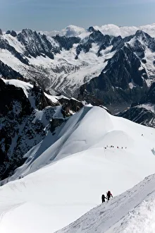 Climbers on Mont Blanc, Aiguille du Midi, Mont Blanc Massif, Haute Savoie Climbers on Mont Blanc, Aiguille du Midi, Mont Blanc Massif, Haute Savoie