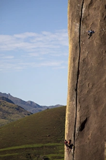 Two climbers tackle a difficult route on a huge buttress on the Tsaranoro Massif Two climbers tackle a difficult route on a huge buttress on the Tsaranoro Massif