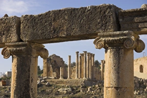 Jerash Ancient City Prints: Close up of column tops with columns beyond