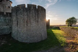 Evening Castle View Prints: Close up of the corner wall tower with sun rays behind it