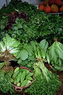 Close-up of greens for sale on a stall in the vegetable Close-up of greens for sale on a stall in the vegetable