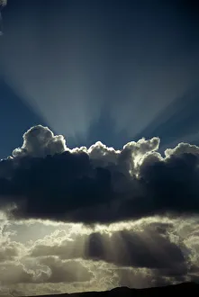 Cloud with silver lining and sunrays over Lanzarote, Canary Islands, Spain, Europe Cloud with silver lining and sunrays over Lanzarote, Canary Islands, Spain, Europe