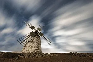 Atlantic Ocean Views Europe Prints: Clouds in the starry sky over a traditional windmill, La Oliva, Fuerteventura