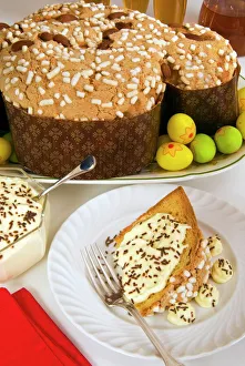 Colomba cake (dove cake) with cream sauce, an Italian speciality for Easter Day Colomba cake (dove cake) with cream sauce, an Italian speciality for Easter Day