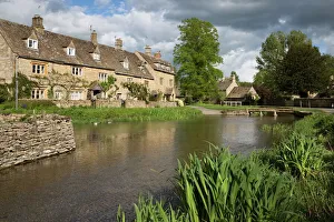 Cotswold stone cottages on the River Eye, Lower Slaughter, Cotswolds, Gloucestershire, England, United Kingdom, Europe Cotswold stone cottages on the River Eye, Lower Slaughter, Cotswolds, Gloucestershire, England, United Kingdom, Europe
