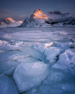 Cracked ice of Flakstadoya lake, Lofoten Islands, Nordland, Norway, Europe Cracked ice of Flakstadoya lake, Lofoten Islands, Nordland, Norway, Europe
