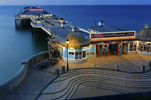 UK Coastal Scenes Prints: Cromer Pier at dusk, summer evening, Norfolk, England, UK