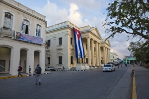 Cuban flag hanging from Palacio Provincial after the death of Fidel Castro, Parque Vidal Cuban flag hanging from Palacio Provincial after the death of Fidel Castro, Parque Vidal