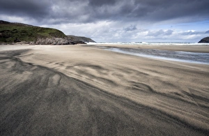 Colourful Horizon Over Water Prints: Dalbeg Beach with intricate patterns in the sand