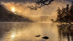 Dawn light and clearing mist over Glenridding and Ullswater, Lake District National Park Dawn light and clearing mist over Glenridding and Ullswater, Lake District National Park