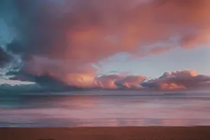 Dawn sky over Carbis Bay beach looking to Godrevy point, St Dawn sky over Carbis Bay beach looking to Godrevy point, St