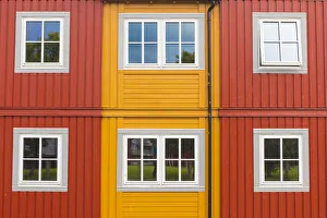 Details of facades and windows of typical wooden houses of fishermen in Svolvaer Details of facades and windows of typical wooden houses of fishermen in Svolvaer