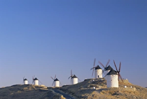 Sunny Mediterranean Landscape Prints: Distant view of hilltop windmills