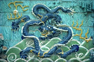 Dragons on tiles on the Dragon wall in the Forbidden City in Beijing, China, Asia Dragons on tiles on the Dragon wall in the Forbidden City in Beijing, China, Asia