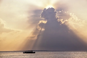 Maldives Sunset Prints: Dramatic cloud formations and boat in silhoutte at sunset, Dhuni Kolhu, Baa Atoll