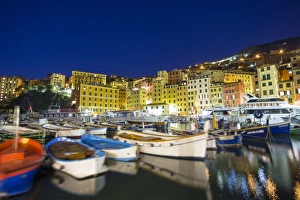 Dusk light on harbour and fishing village of Camogli, Gulf of Paradise, Portofino National Park Dusk light on harbour and fishing village of Camogli, Gulf of Paradise, Portofino National Park
