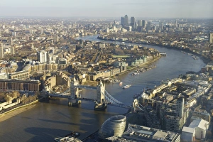 Elevated view of the River Thames looking East towards Canary Wharf with Tower Bridge in Elevated view of the River Thames looking East towards Canary Wharf with Tower Bridge in