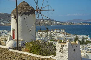 Elevated view of windmills and town, Mykonos Town, Mykonos, Cyclades Islands Elevated view of windmills and town, Mykonos Town, Mykonos, Cyclades Islands