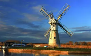 Windmill Sunset Scene Prints: Evening light, Thurne Mill and river Thurne, Norfolk Broads, Norfolk