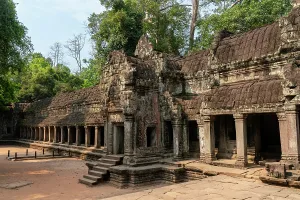 Prints of Exploring ancient stone structures at Ta Prohm Temple in Angkor, Cambodia Angkor Prints: Ta Prohm Temple Print, Cambodia