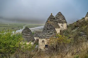 Misty Mountain Scenery Prints: Exploring ancient structures in the city of the Dead located in Dargavs