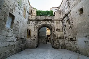 Prints of Exploring Diocletian's Palace in Split, Croatia through stone archways and ancient streets Split Prints: Diocletian's Palace Print - Stone Archways in Split, Croatia