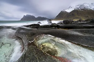 The Eye rock formation tourist attraction in the wild landscape of Uttakleiv, Leknes, Vestvagoy, Lofoten Islands The Eye rock formation tourist attraction in the wild landscape of Uttakleiv, Leknes, Vestvagoy, Lofoten Islands