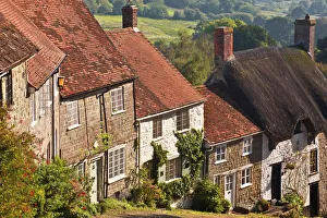 The famous cobbled street of Gold Hill in Shaftesbury, Dorset, England, United Kingdom The famous cobbled street of Gold Hill in Shaftesbury, Dorset, England, United Kingdom