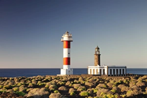 Faro de Fuencaliente lighthouses at sunrise, Punta de Fuencaliente, La Palma, Canary Islands Faro de Fuencaliente lighthouses at sunrise, Punta de Fuencaliente, La Palma, Canary Islands