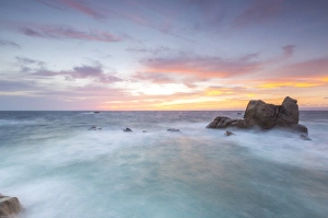 Capo Testa Italy Prints: The fiery sky frames the waves crashing on rocks, Capo Testa, Santa Teresa di Gallura
