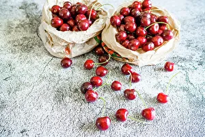 Fresh Cherries Prints: Fresh ripe cherries on a table at springtime, Italy, Europe