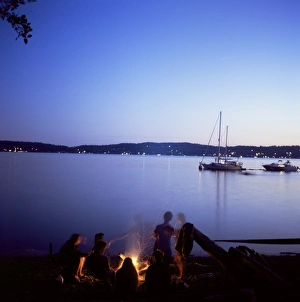 Pacific Northwest Travel Destinations Prints: Friends around beach fire