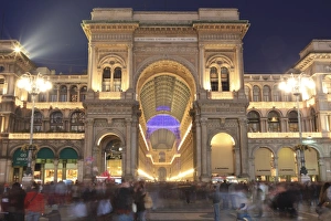 Galleria Vittorio Emanuele entrance illuminated at dusk, Milan, Lombardy, Italy, Europe Galleria Vittorio Emanuele entrance illuminated at dusk, Milan, Lombardy, Italy, Europe