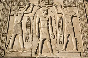 Gods Thoth on left and Haroeris on right with the Pharaoh in the centre, Wall Reliefs Gods Thoth on left and Haroeris on right with the Pharaoh in the centre, Wall Reliefs