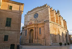 Golden sandstone facade of the Cathedral of Santa Maria, sunrise, Ciutadella (Ciudadela) Golden sandstone facade of the Cathedral of Santa Maria, sunrise, Ciutadella (Ciudadela)