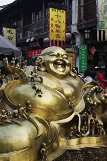 Sculpture Prints: Golden Buddha Print: Qinghefang Old Street, Hangzhou, China