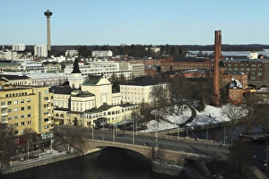 The Hameenkatu Bridge crosses the River Tammerkoski by the Tampere Theatre in Tampere The Hameenkatu Bridge crosses the River Tammerkoski by the Tampere Theatre in Tampere
