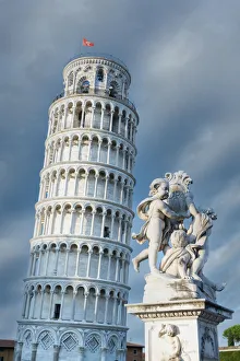 High section of Pisa Leaning Tower and marble statues of fountain High section of Pisa Leaning Tower and marble statues of fountain