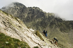 European Mountain Climbing Prints: Hikers on difficult trail