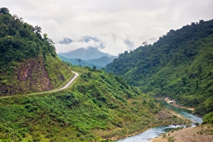Ho Chi Minh Highway West passing through jungle landscape, Quang Ninh District Ho Chi Minh Highway West passing through jungle landscape, Quang Ninh District
