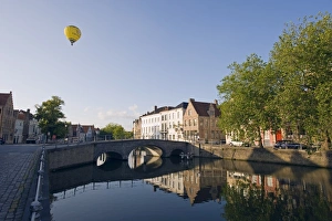 Bruges Old Town Prints: Hot air balloon floating over rooftops, houses reflected in a canal, old town