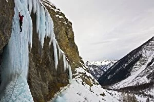 Images Dated 23rd December 2007: An ice climber ascending a frozen cascade in the Fournel Valley, Ecrins Massif, France