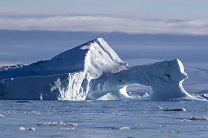Iceberg calved from glacier from the Greenland Icecap in De Dodes Fjord Iceberg calved from glacier from the Greenland Icecap in De Dodes Fjord