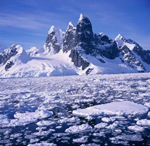Iceflow off the rugged west coast of the Antartic Peninsula, Antarctica Iceflow off the rugged west coast of the Antartic Peninsula, Antarctica